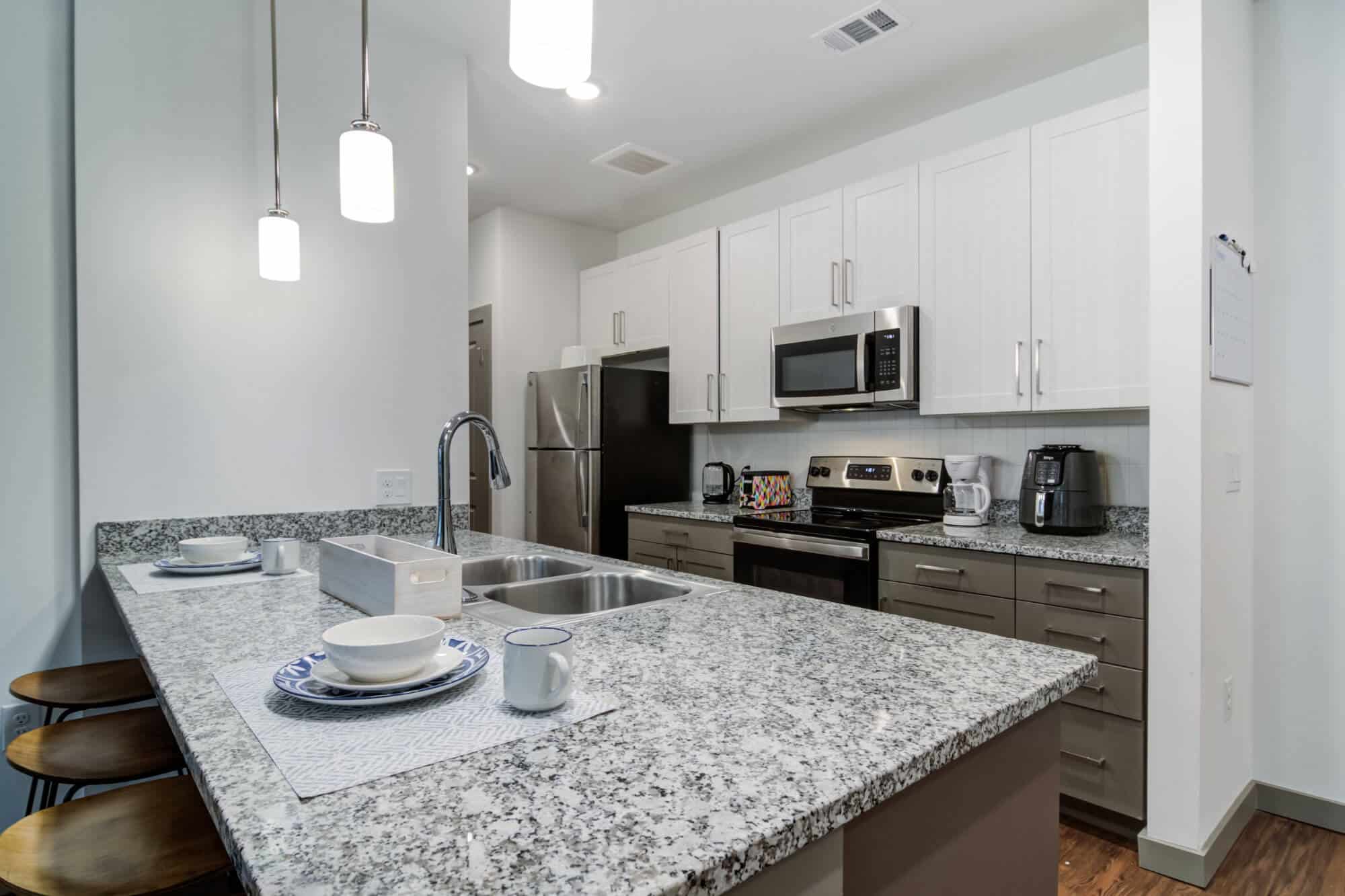 14 sixtyfive off campus apartments near kennesaw university spacious kitchen with breakfast bar granite countertops energy efficient stainless steel appliances